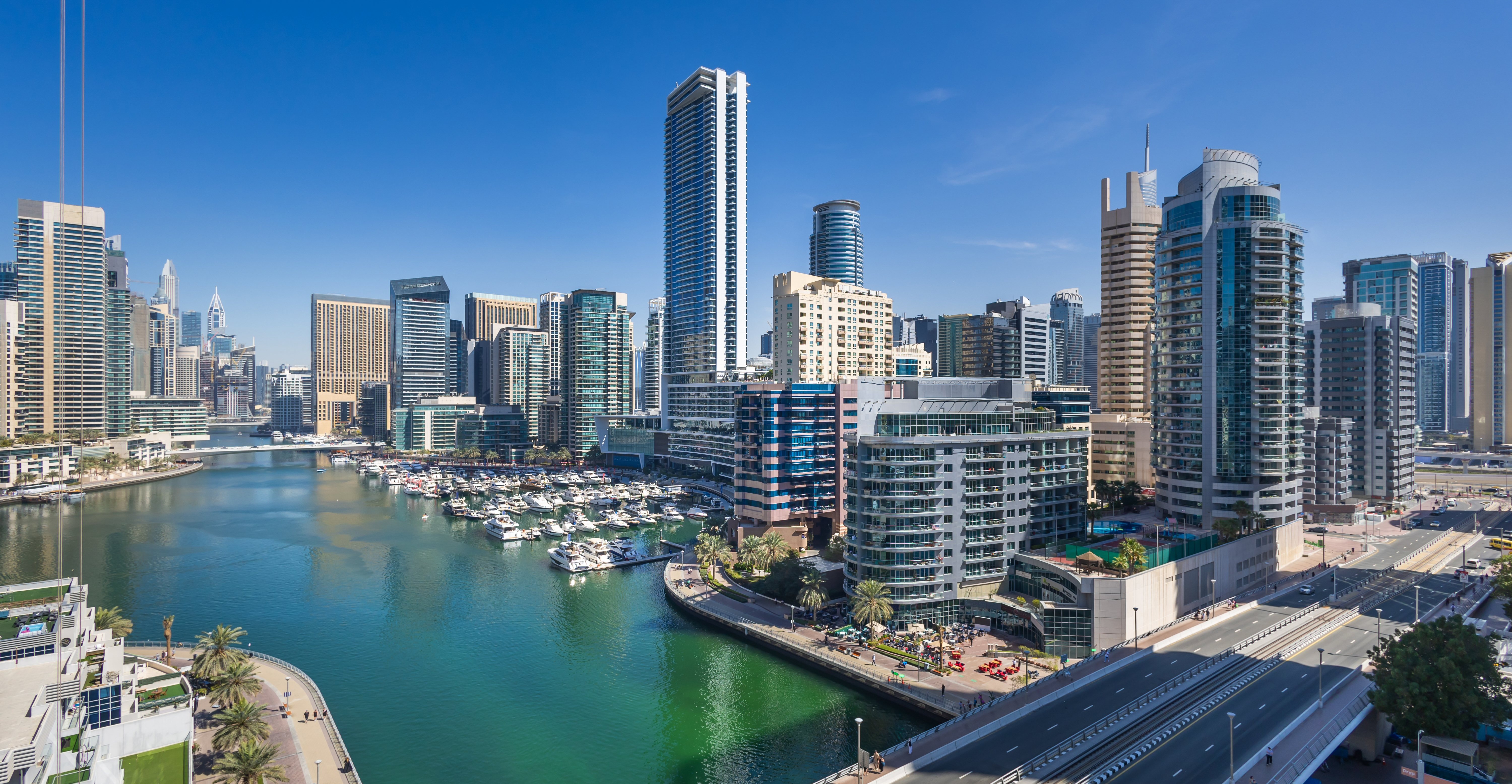 Aerial view of yachts and boats from luxury apartments in Dubai, UAE