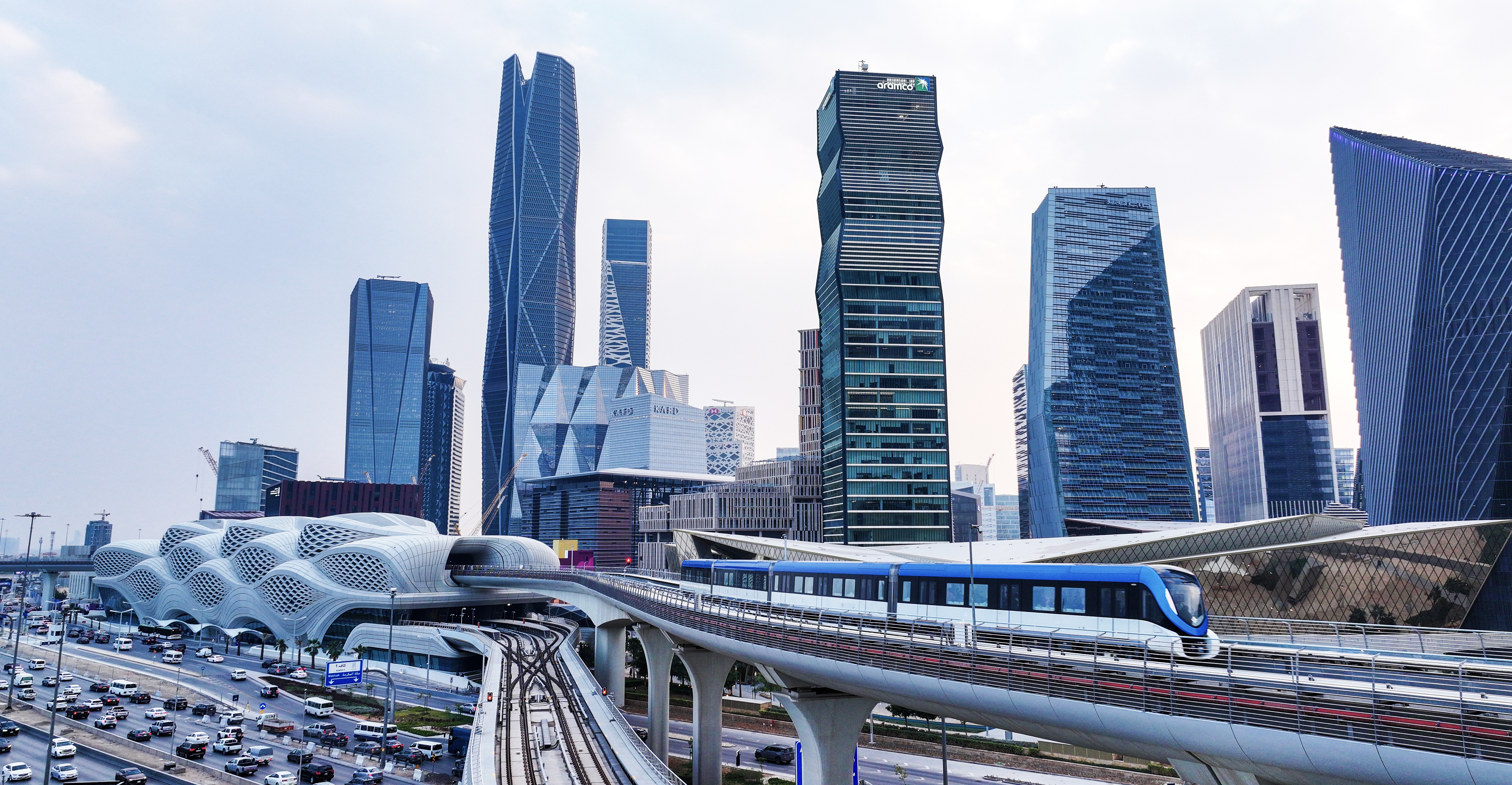 Riyadh, Saudi Arabia: The Blue Line of the Riyadh Metro at the CASD station, with the city skyline in the background